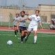 Rachel Roth and a WBU opponent head for the ball. Photo by Melissa Bauer-Herzog.