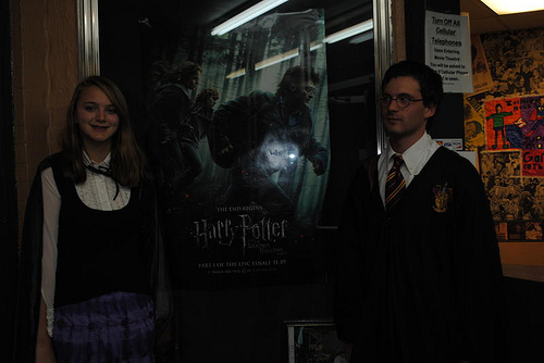 hp3 WT Students beside the Deathly Hallows poster at the Varsity Theater.