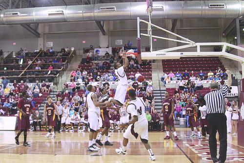 JR Courtney Carr From Selma Alabama slam dunks for another point againts the Midwestern State Mustangs. Photo by Frankie Sanchez.