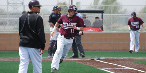 Bryce Baugh running to first base. Photo by Melissa Bauer-Herzog.