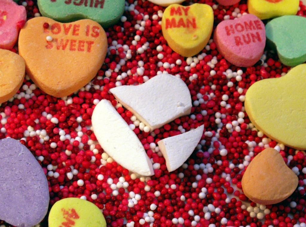 Photo by Sister72 on Flickr. Provided courtesy of a Creative Commons Attribution Liscense. Heart candies with a broken heart in the middle. Photo by Sister72 on Flickr. Provided courtesy of a Creative Commons Attribution Liscense.