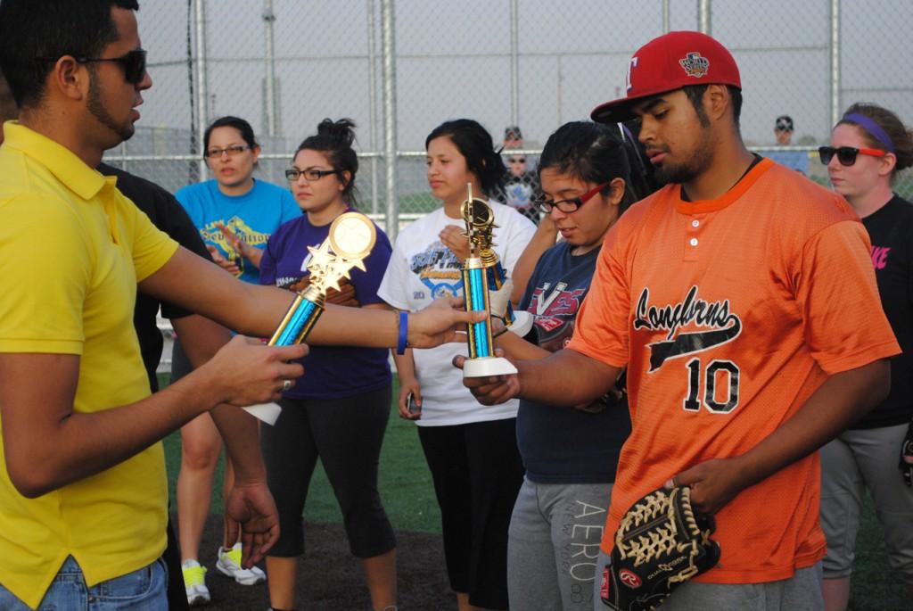 ATO members handed out trophies to team member for the winning team, “2 Legit.” Photo by Lisa Hellier.