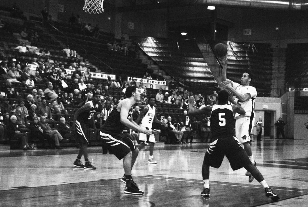WT player Miles Gatewood takes a shot over two Javelina defenders.